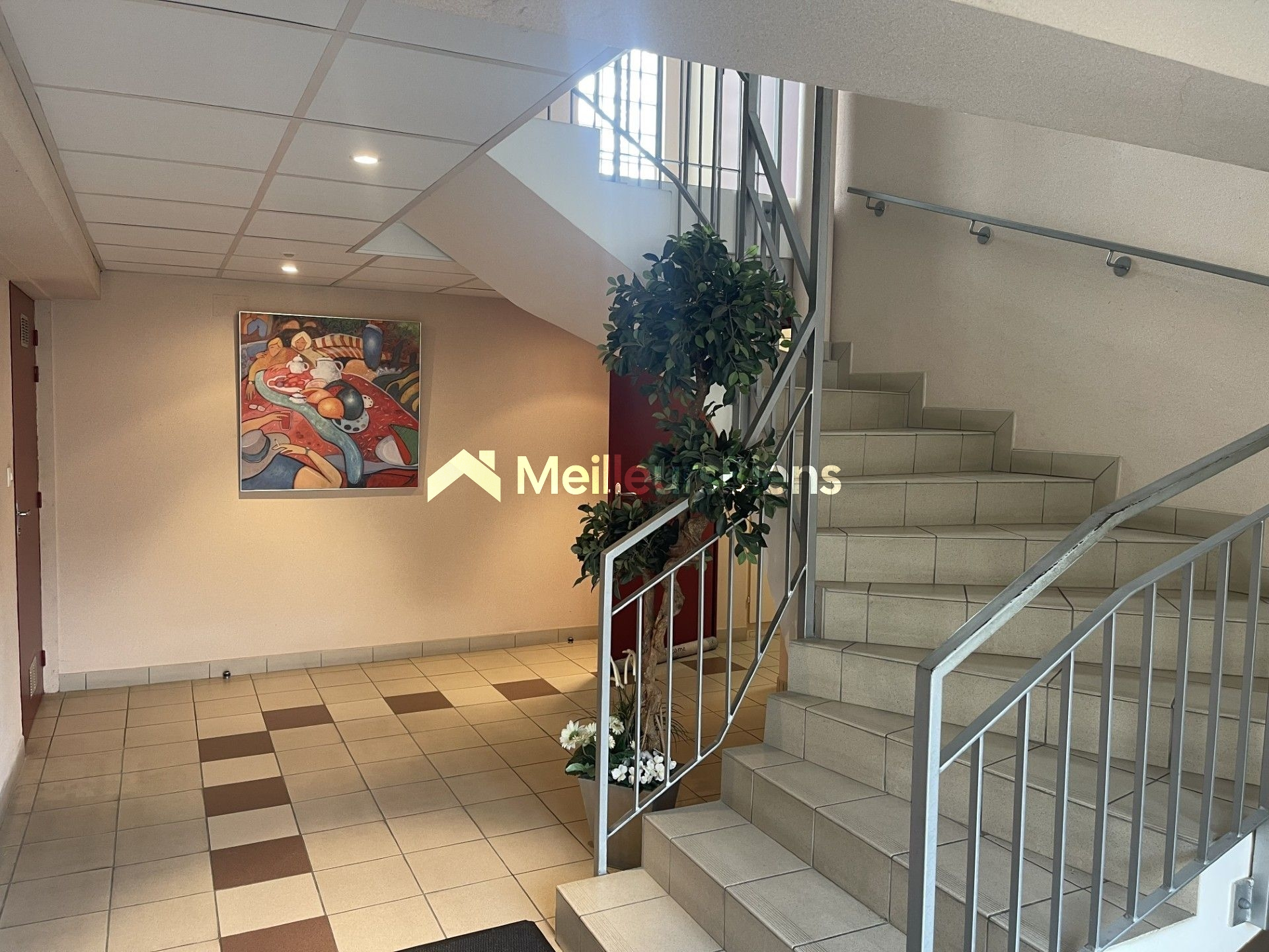 Appartement en rez de jardin avec garage et espace vert